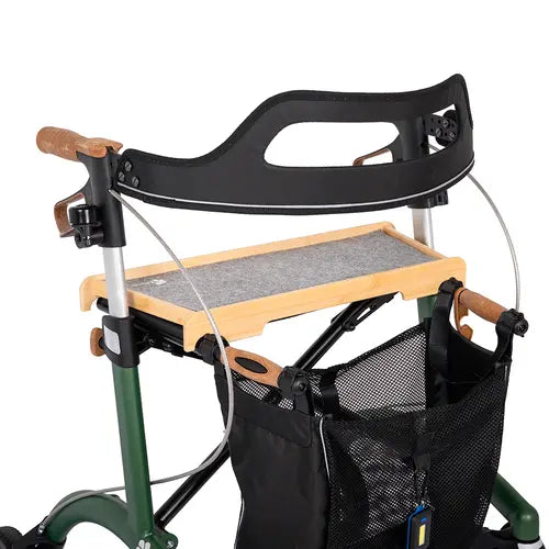 Bamboo Saljol tray resting on the seat of a green Saljol rollator
