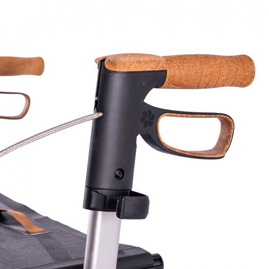 Close-up of the Saljol stick holder on a rollator frame with cork handles