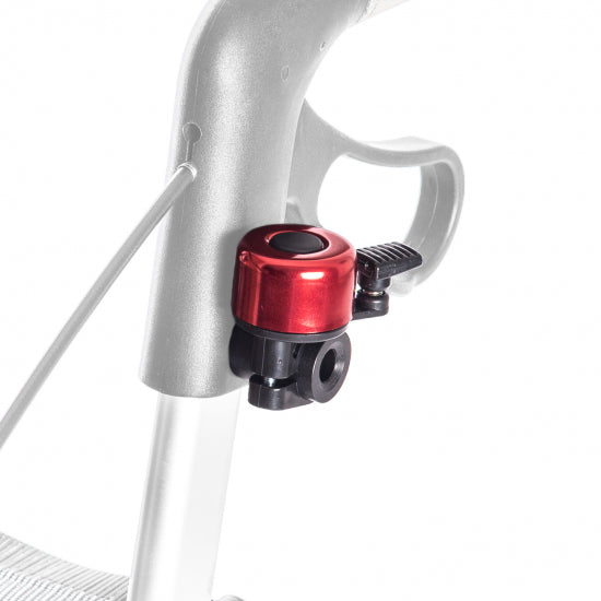 Red Saljol bell mounted on the handlebar tube of a rollator