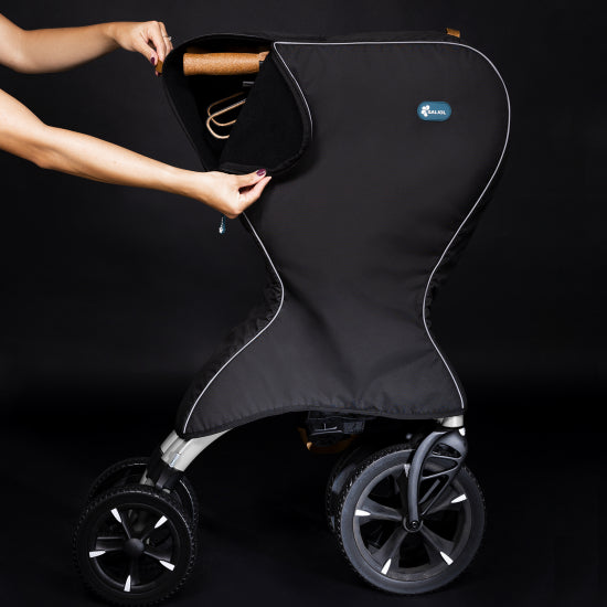 Hands zipping the Saljol travel bag around a folded rollator