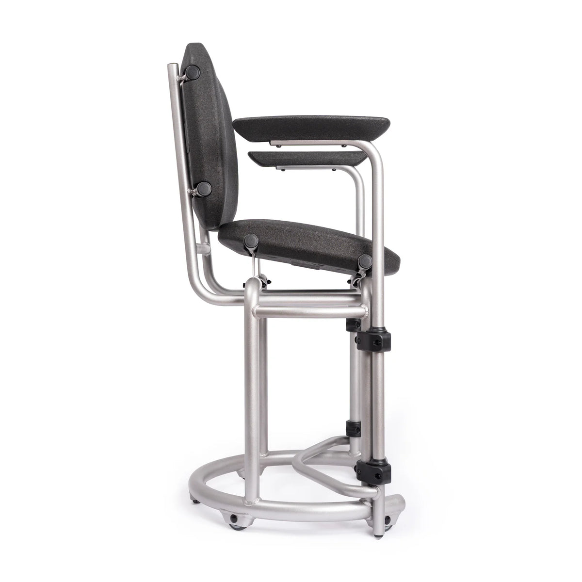 Saljol shower chair seen from the side with the adapter set fitted, seat tilted into the wedge position